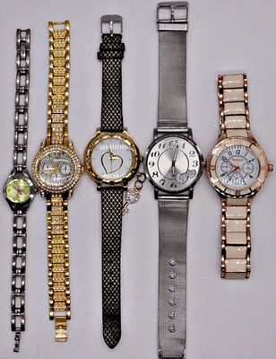 Five Women's Wristwatches, Mixed Brands and Metals. Lot of five women's wristwatches spanning 