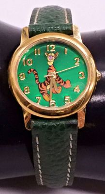 Disney Store Tigger Character Watch. Gold-tone wristwatch featuring Disney's Tigger character on 
