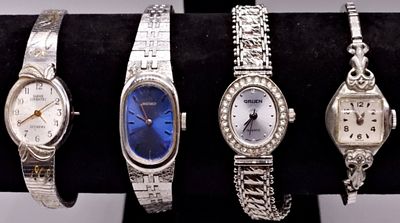 Four Ladies Silver-Tone Watches, Mixed Brands. A quartet of silver-tone ladies' wristwatches 