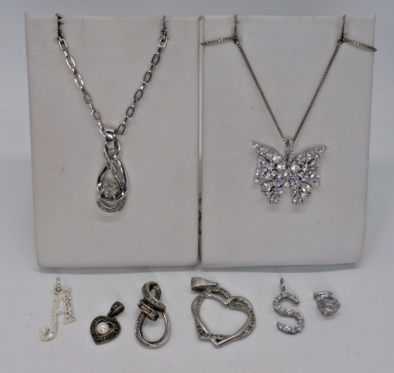 8 Simulated Diamond Pendants & Chains