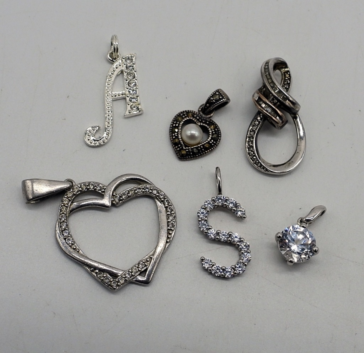 8 Simulated Diamond Pendants & Chains