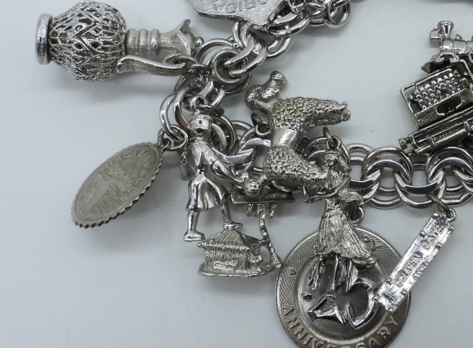 Vintage Sterling Charm Bracelet - 17 Charms