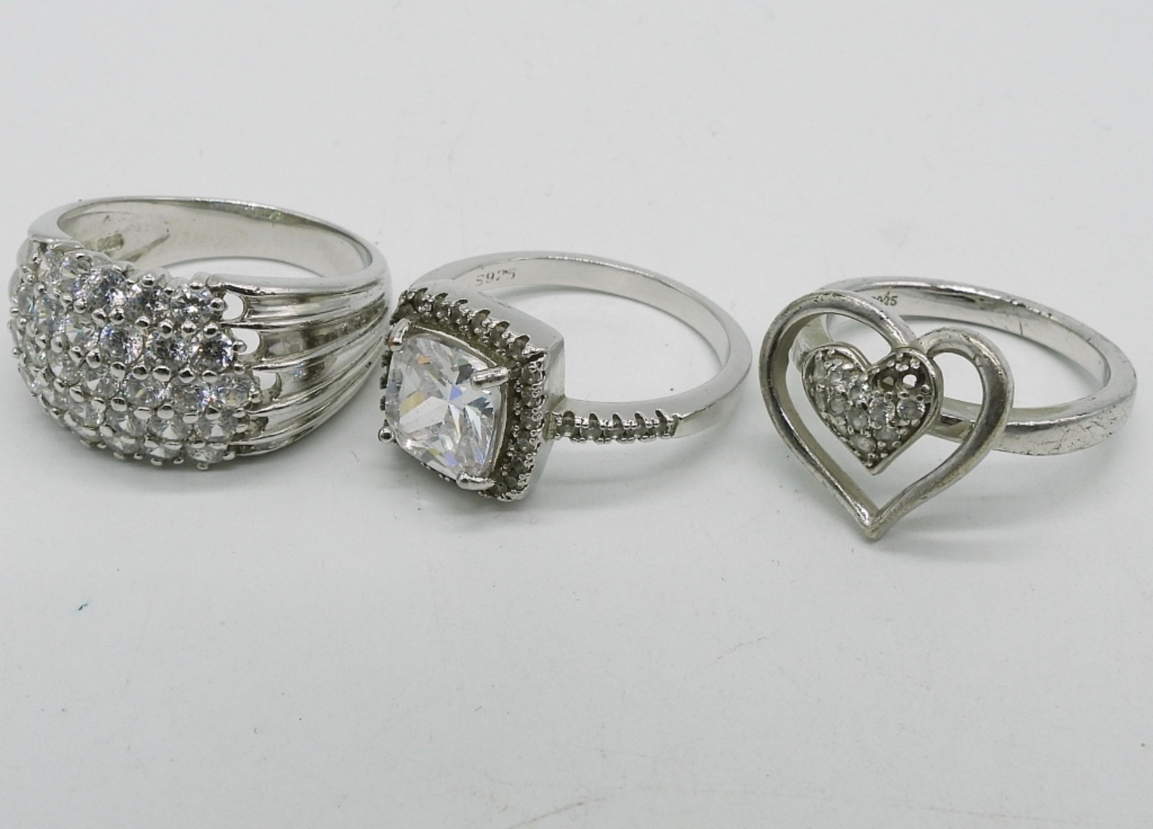 7 Sterling Simulated Diamond Rings & More