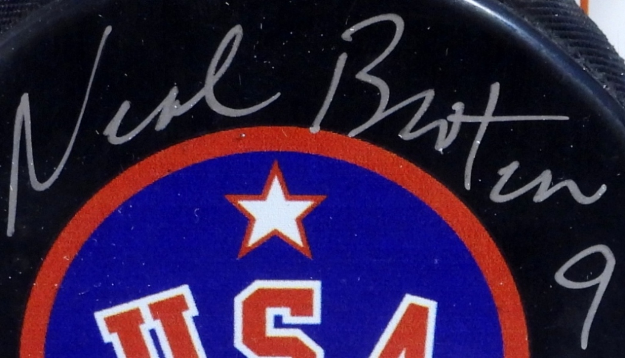 Neal Broten Autographed Hockey Puck