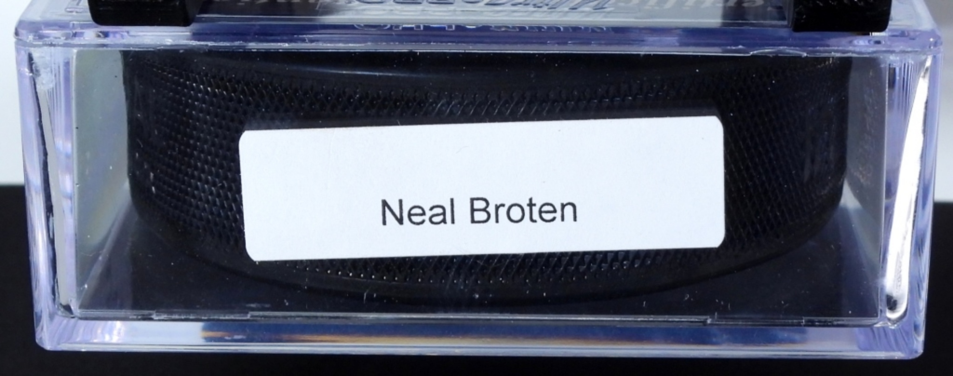 Neal Broten Autographed Hockey Puck