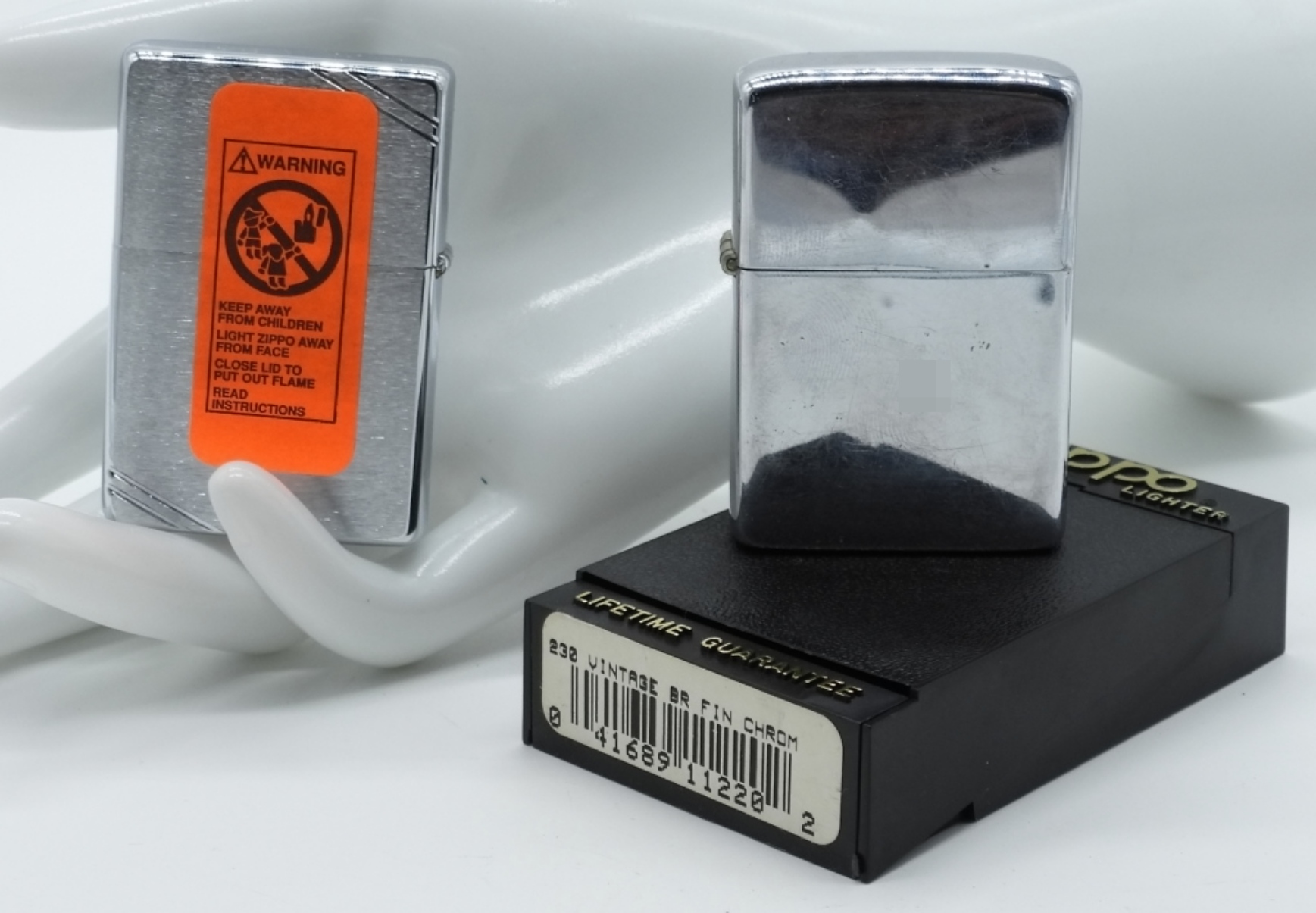 Two Zippo Lighters - 1937 Replica & 1973 Chrome