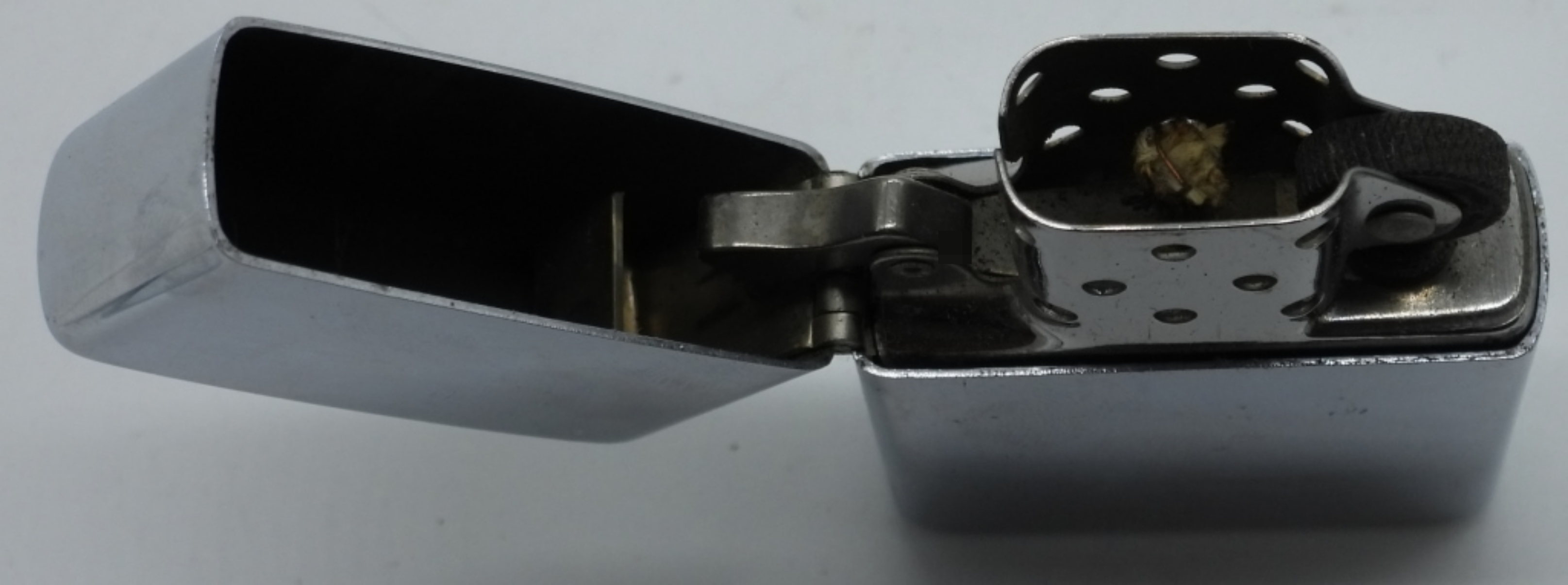 Two Zippo Lighters - 1937 Replica & 1973 Chrome