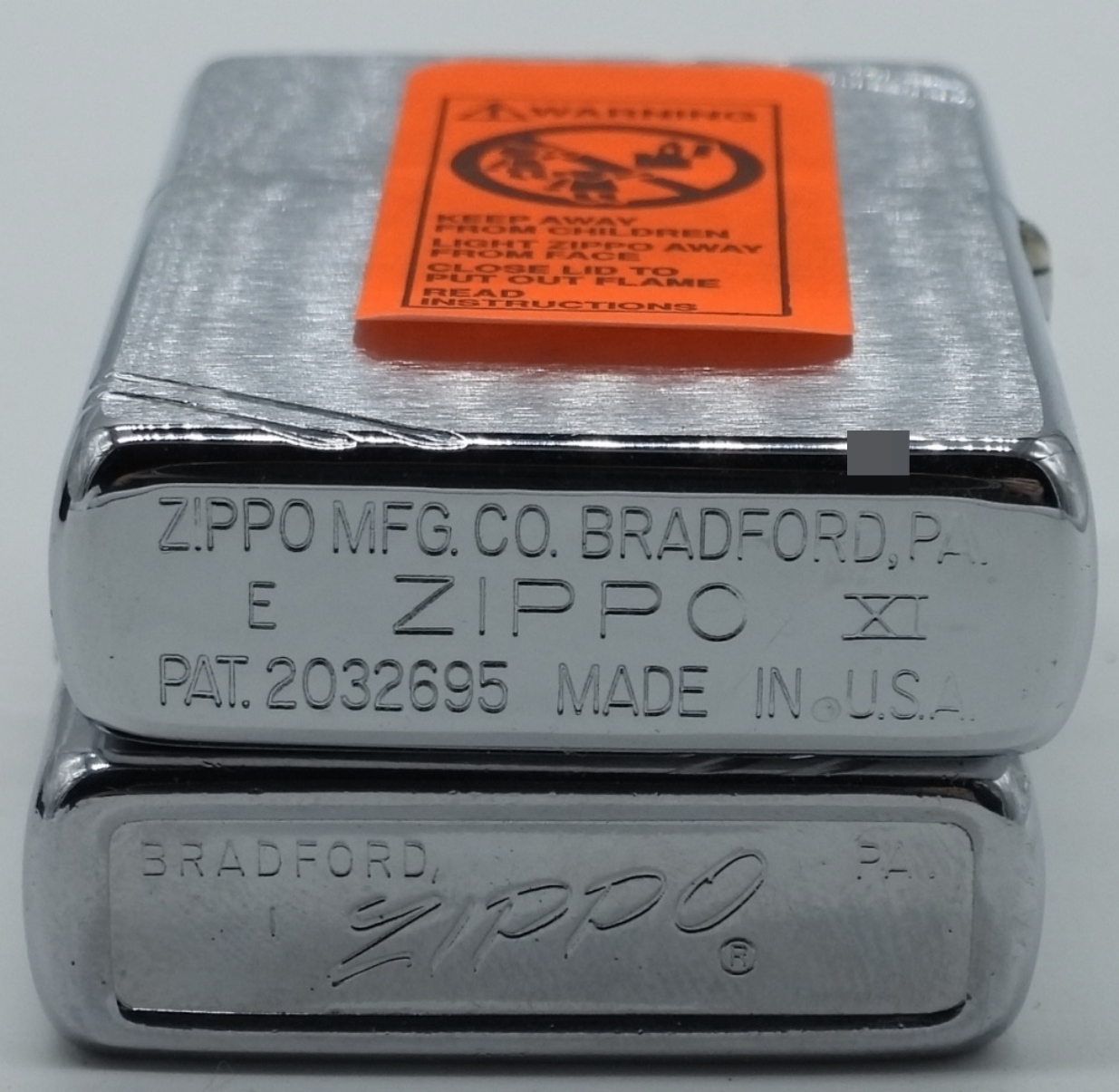 Two Zippo Lighters - 1937 Replica & 1973 Chrome