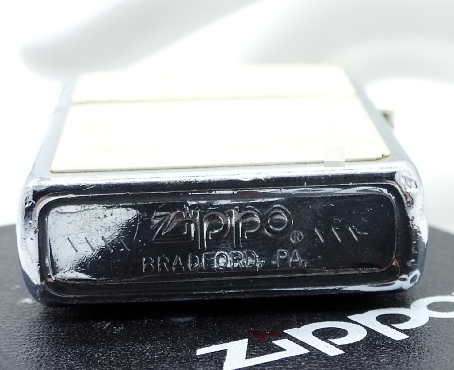 Vintage Zippo Lighter with Scrimshaw Ship Design