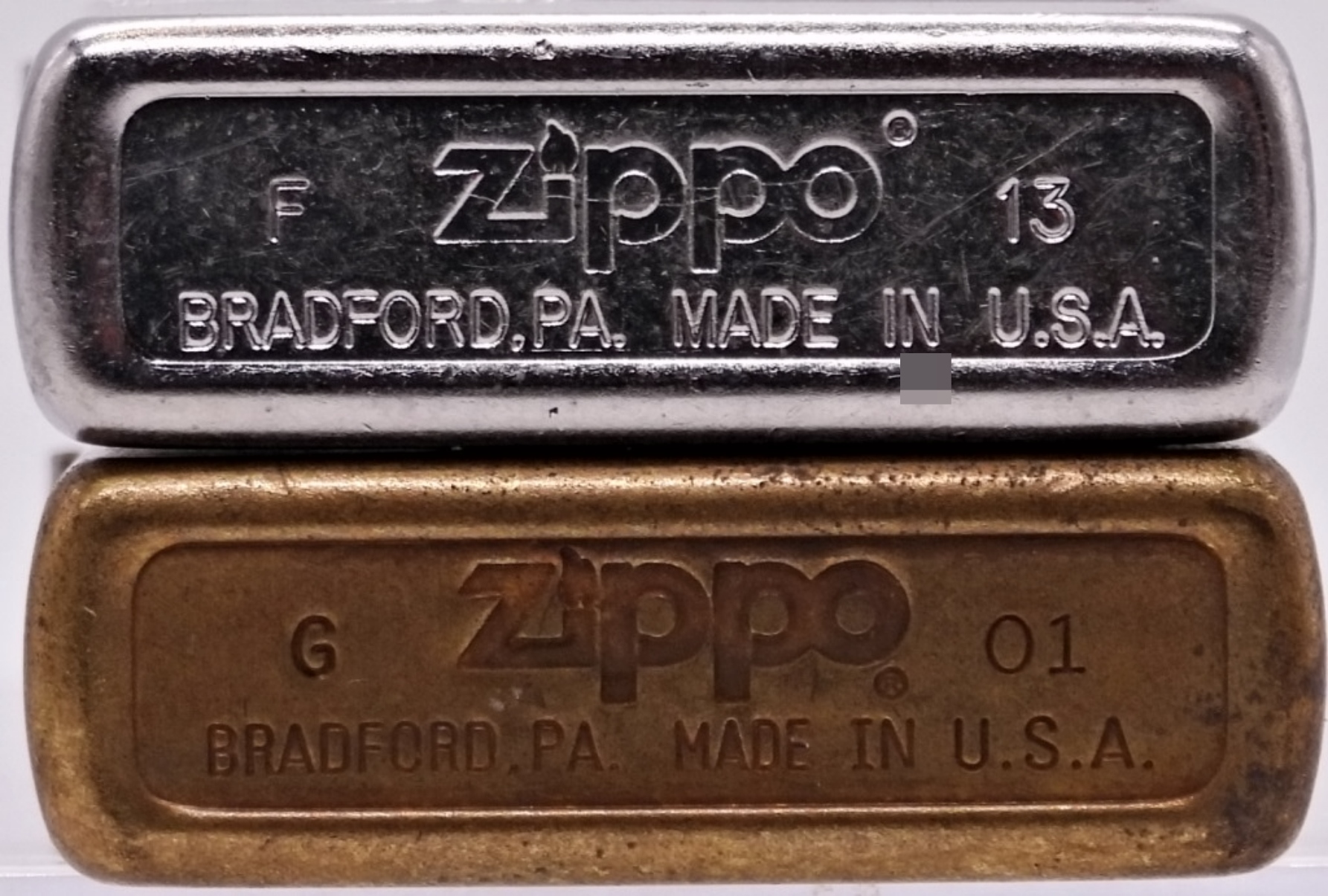 Pair of Zippo Lighters, 2001 & 2013, Unfired