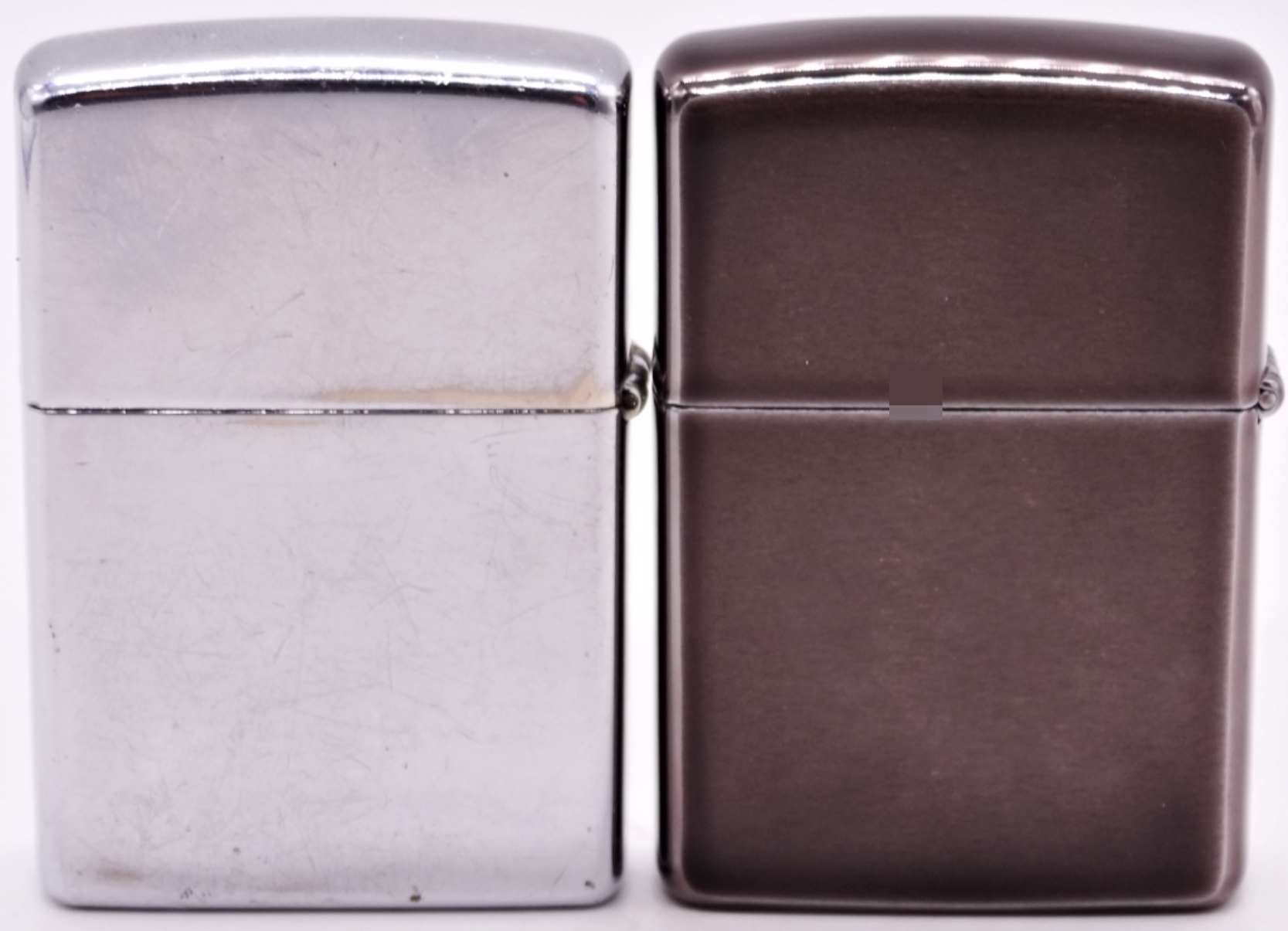 Two Camel Zippo Lighters, 1992 and 1997