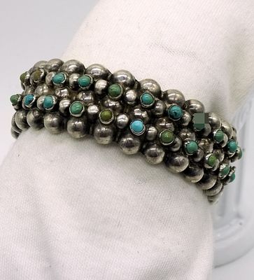 Mexican Silver Bracelet Blue Green Turquoise. Hinged cuff bracelet marked, "Silver Mexico F" 
