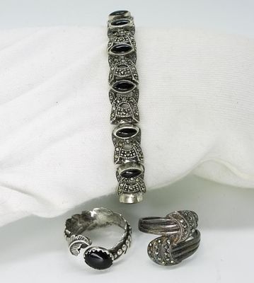 Sterling Black Onyx Bracelet & Rings. Marked 925 sterling silver set featuring elaborate 