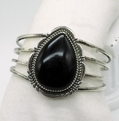 Sterling Onyx Cuff Bracelet with Bear Mark. Marked sterling silver construction with distinctive 