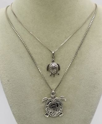 2 Sterling Silver Turtle Pendant Necklaces. Two marked 925 sterling silver turtle pendants on 
