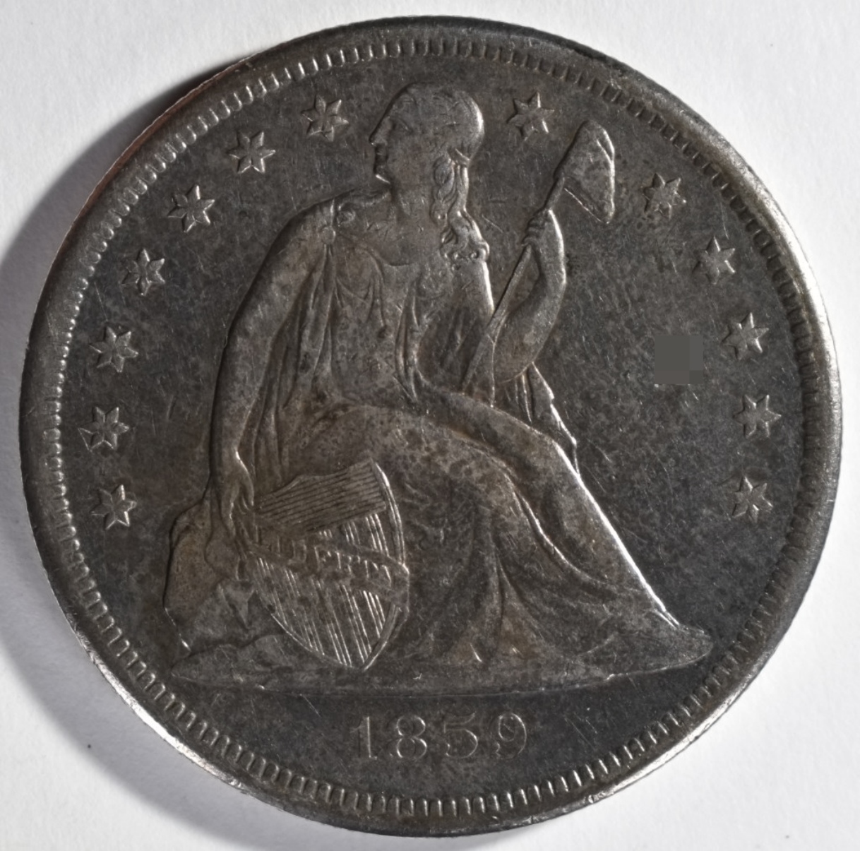 1859-O Seated Dollar