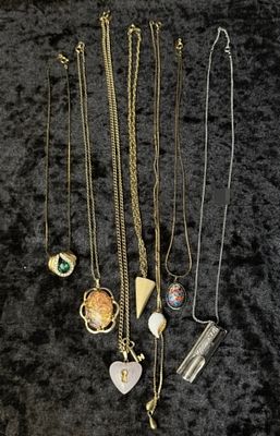 7 Necklaces Mixed Tones. A grouping of 7 necklaces in mixed gold-tone and silver-tone finishes 
