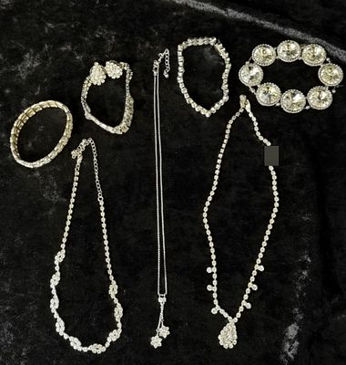 Silver-Tone Rhinestone Jewelry Lot, 7 Pcs. Seven silver-tone costume pieces set with clear 