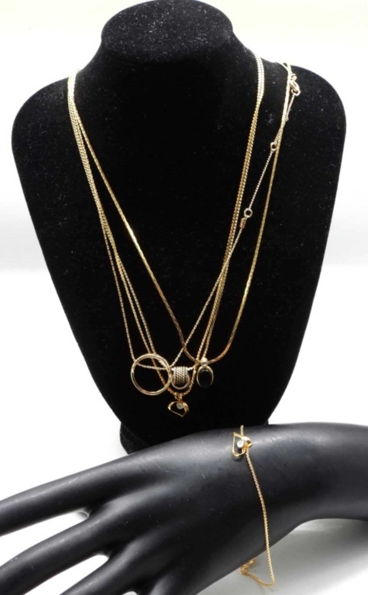 Gold Chains and Bracelet with Pendants