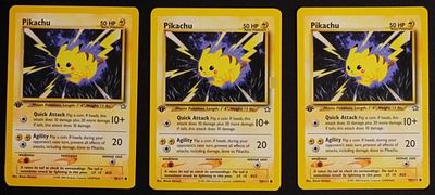2000 Pikachu Neo Genesis 1st Edition, Lot of 3. Three raw copies of the 1st Edition Pikachu from 