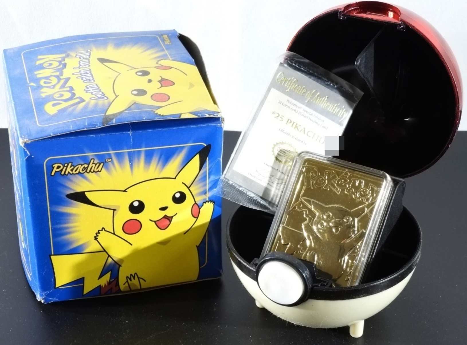 1999 Pikachu #25 23K Gold Card, Poke Ball Case