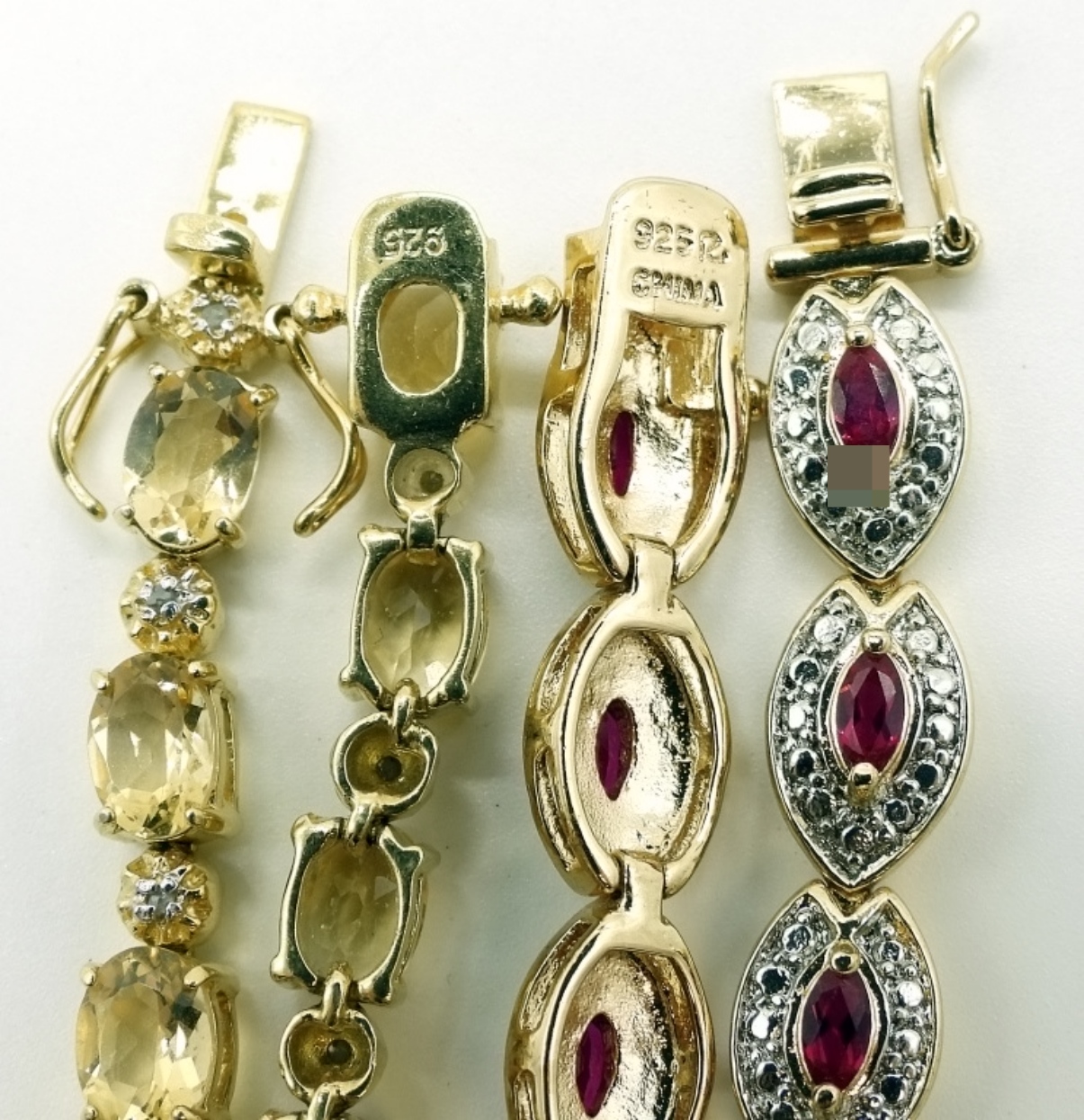 Two 925 Citrine and Garnet Gold Tone Bracelets