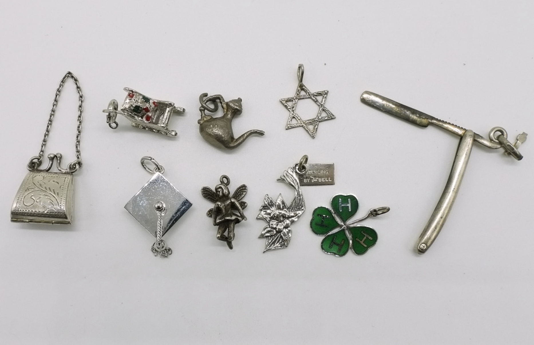 9 Vintage Sterling Charms