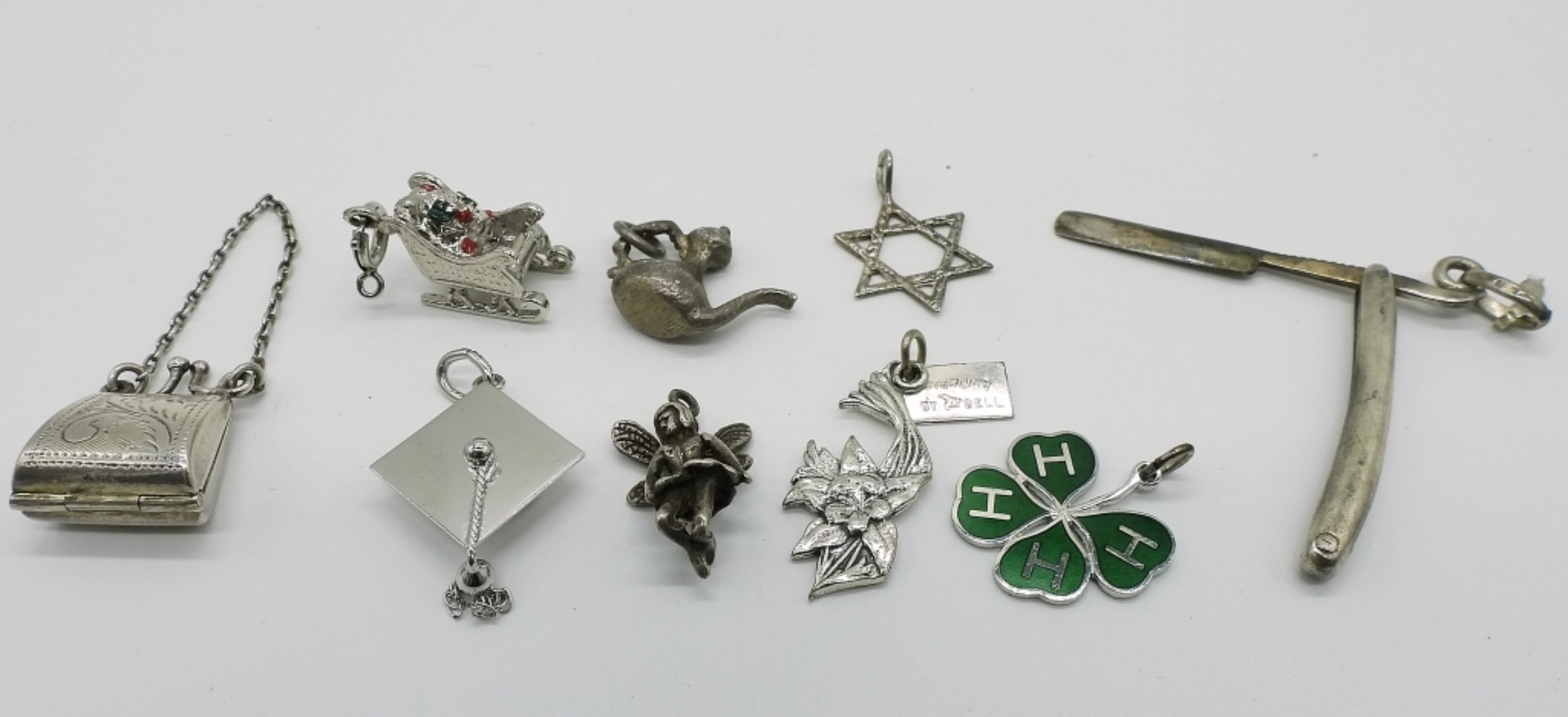 9 Vintage Sterling Charms