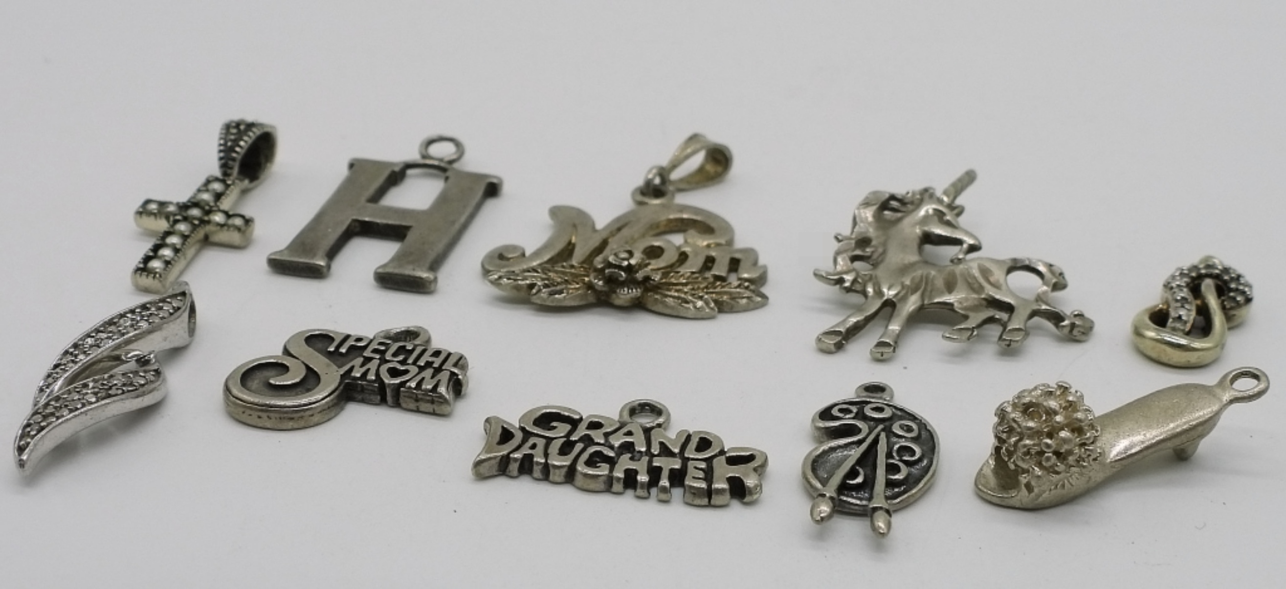 10 Sterling Pendants & Charms