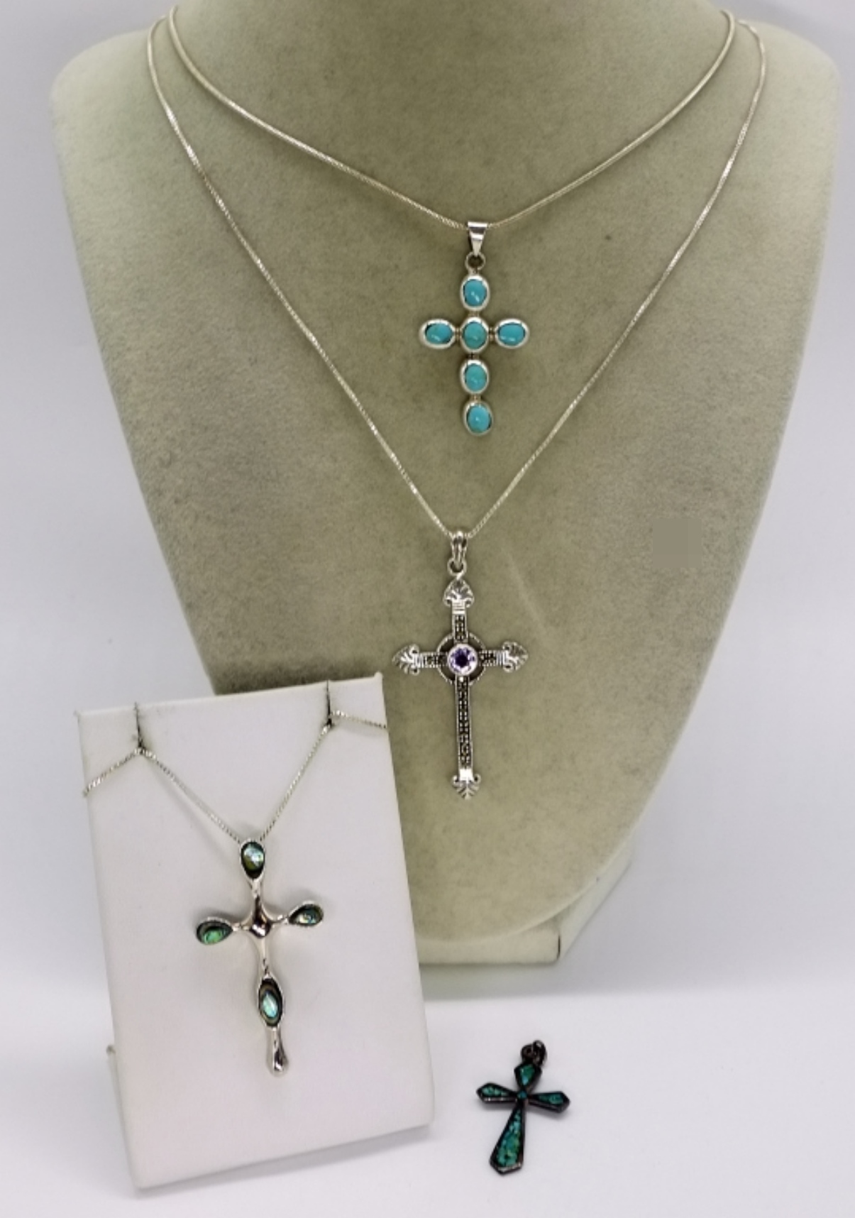 Four Sterling Cross Pendants & Chains