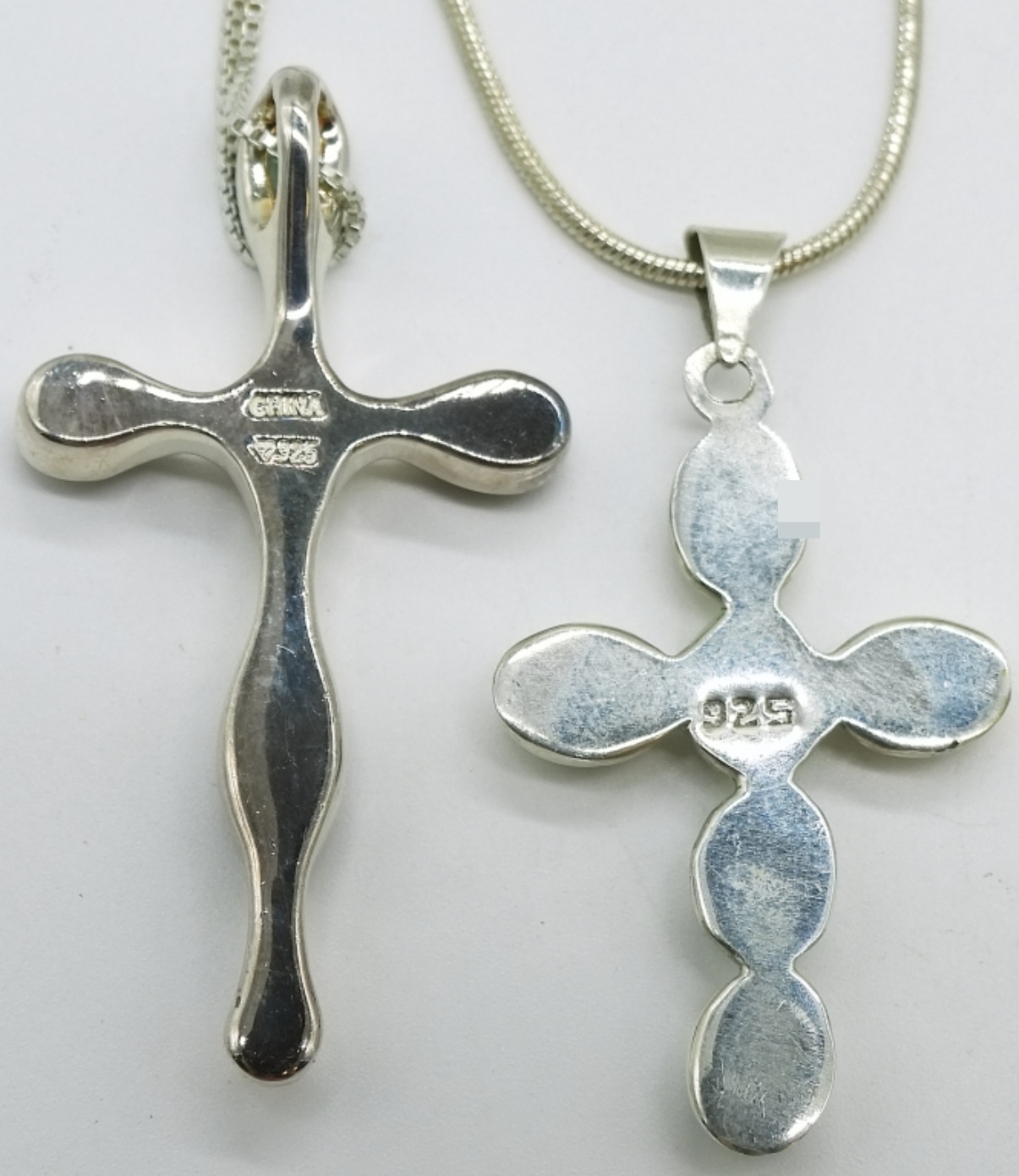 Four Sterling Cross Pendants & Chains