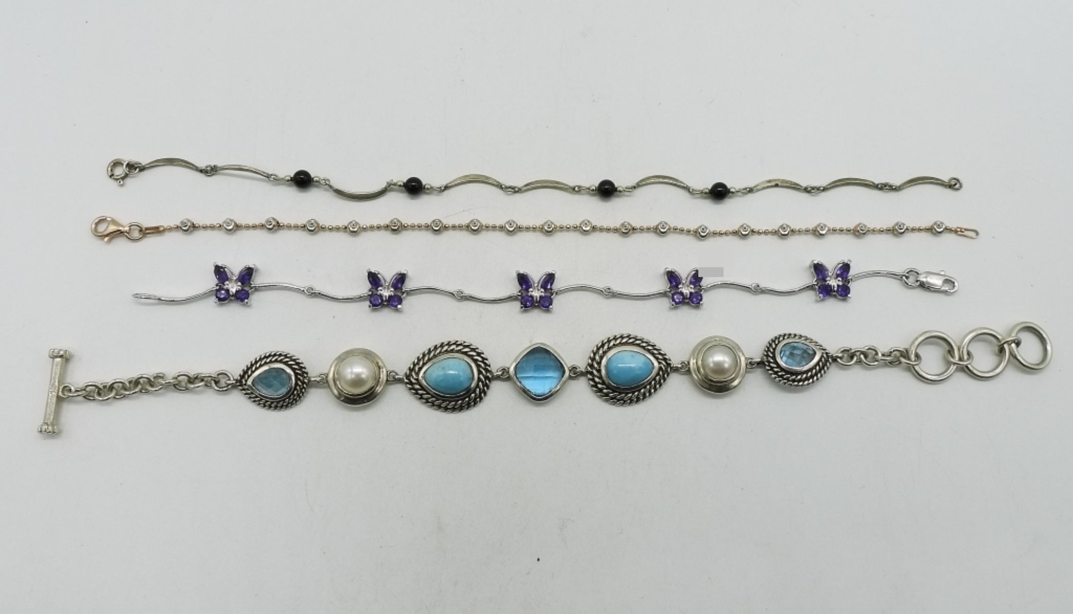 Four Sterling Bracelets with Larimar & Amethyst