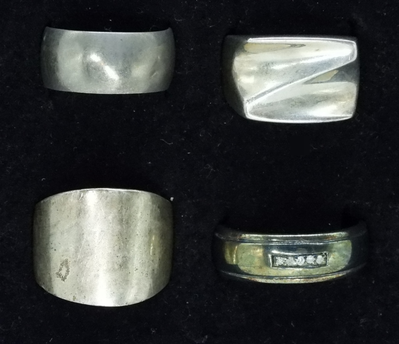 Four Sterling Silver Bands, Sizes 8-12