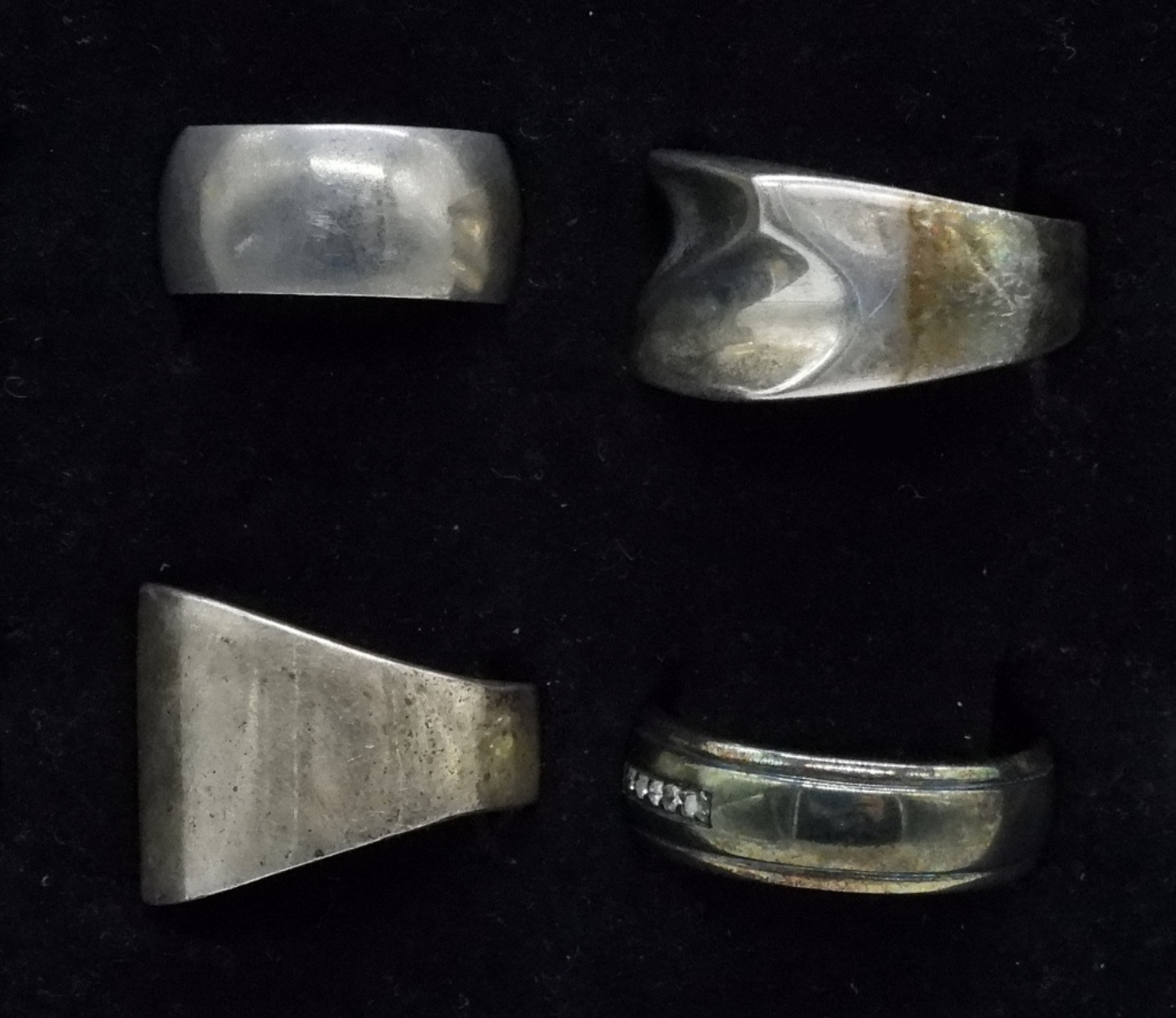 Four Sterling Silver Bands, Sizes 8-12