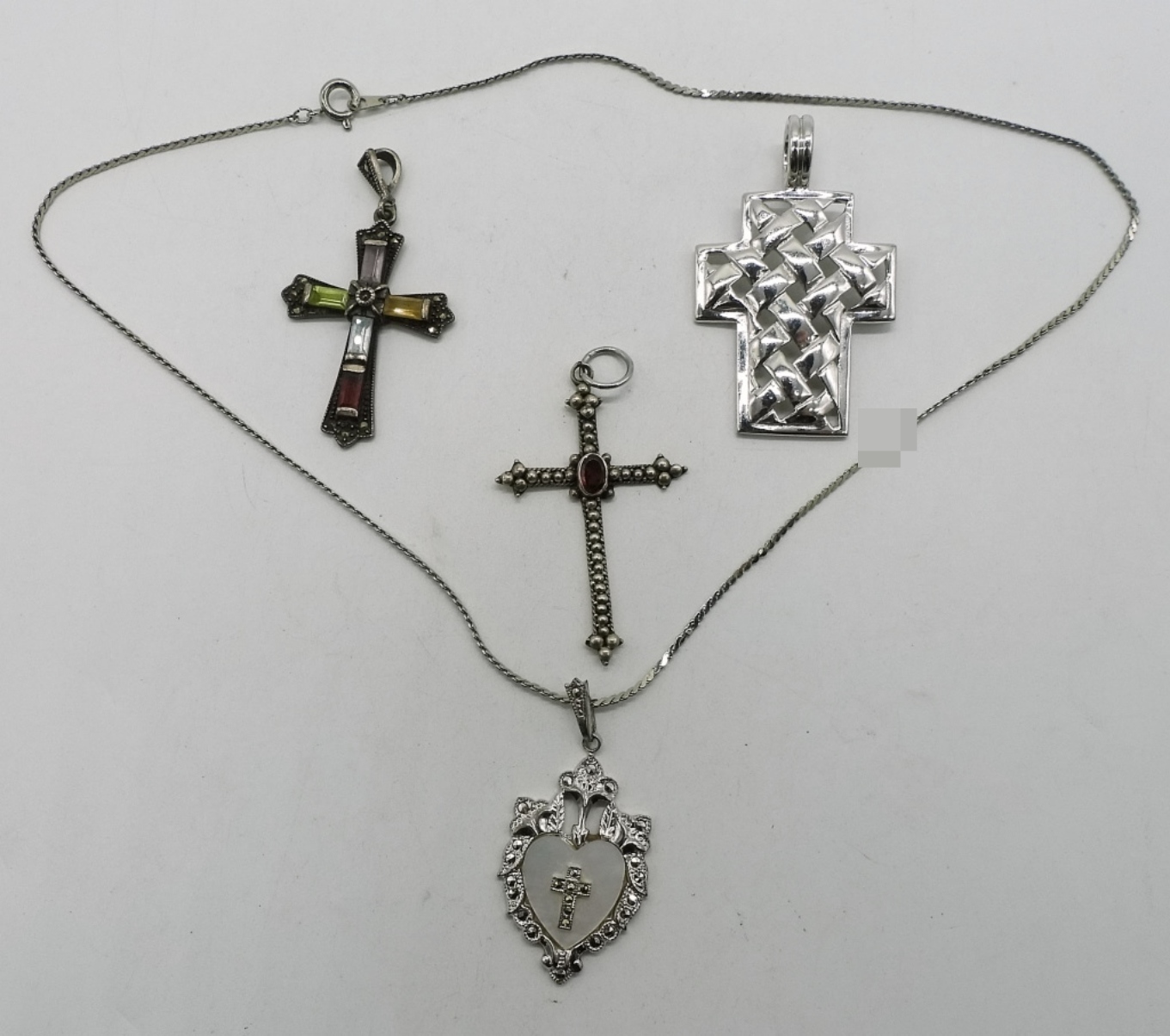 Four Sterling Cross Pendants & One Chain