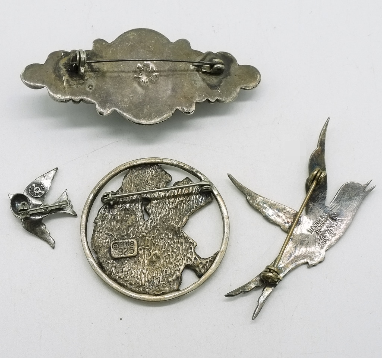 Four Vintage Sterling Pins