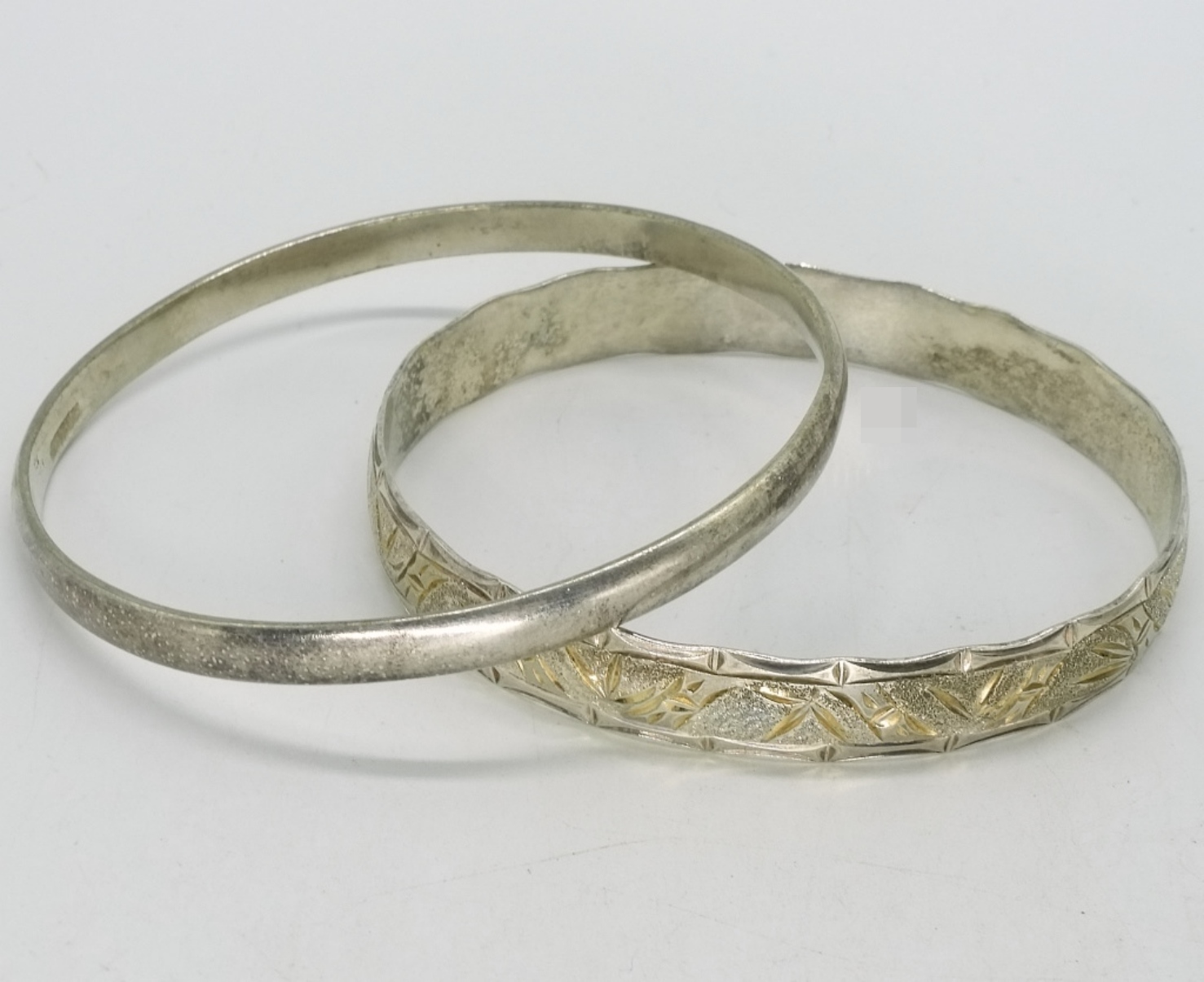 Two Sterling Multi Tone Bangles