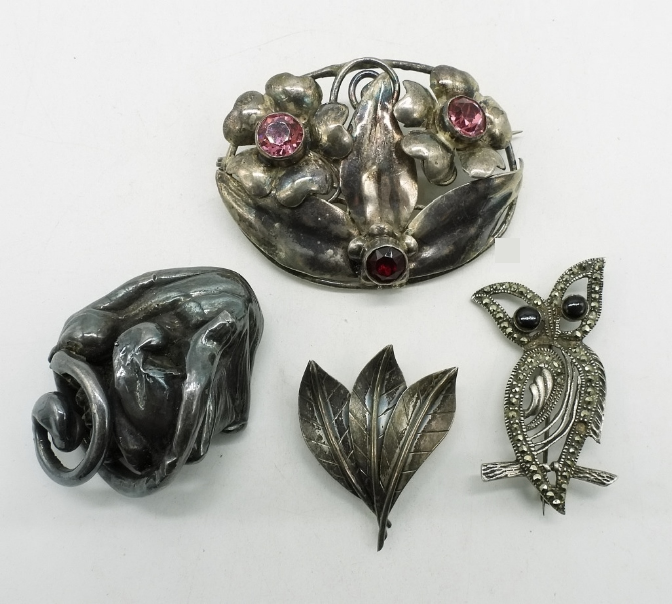 Four Sterling Brooches