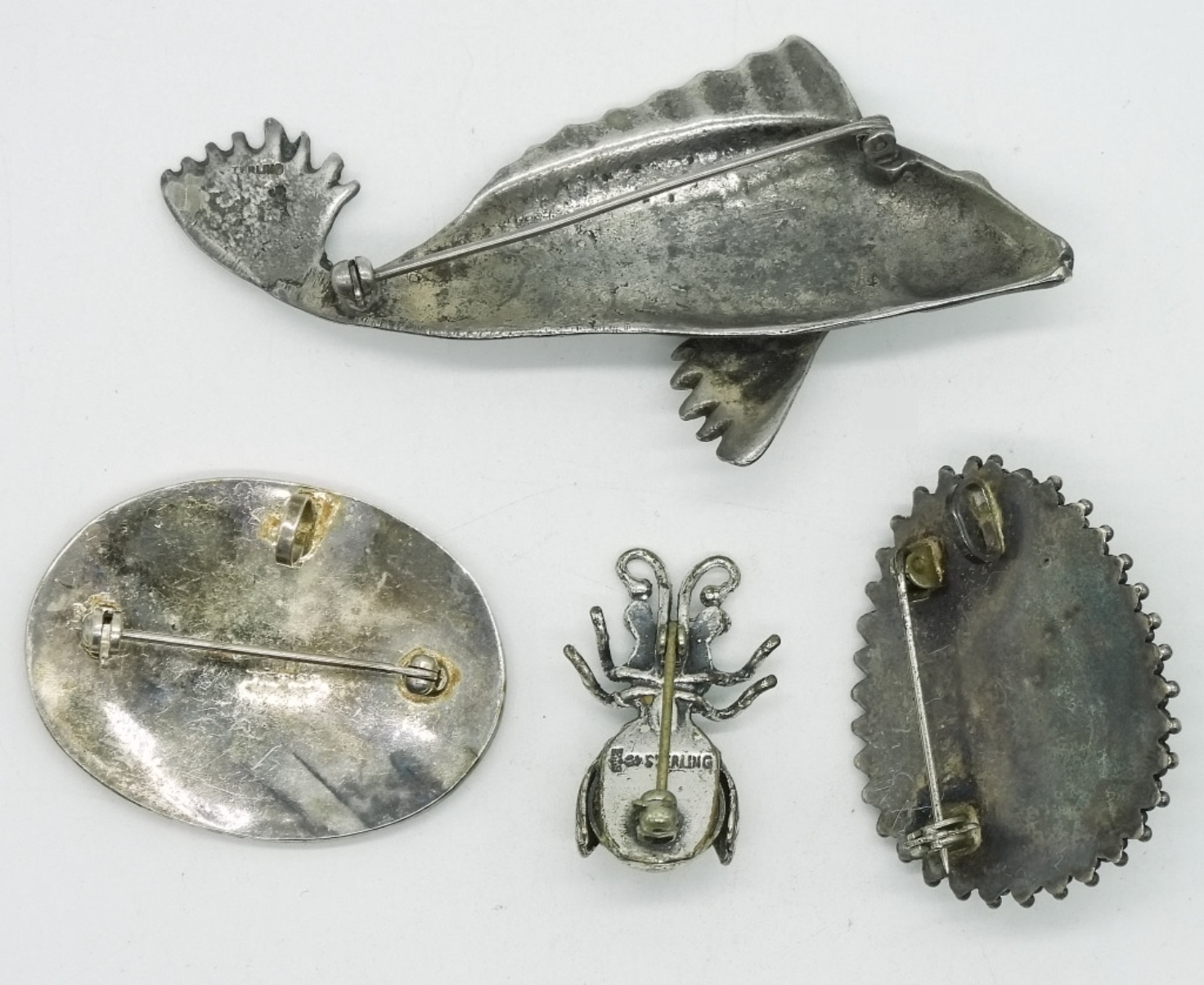 Four Vintage Sterling Brooches