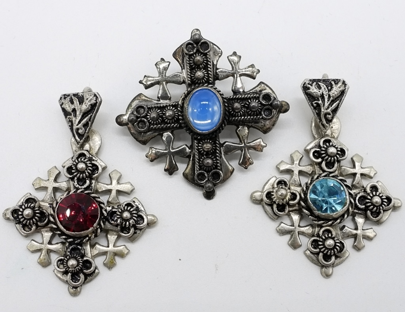 Three 900 Silver Jordan Cross Pendants