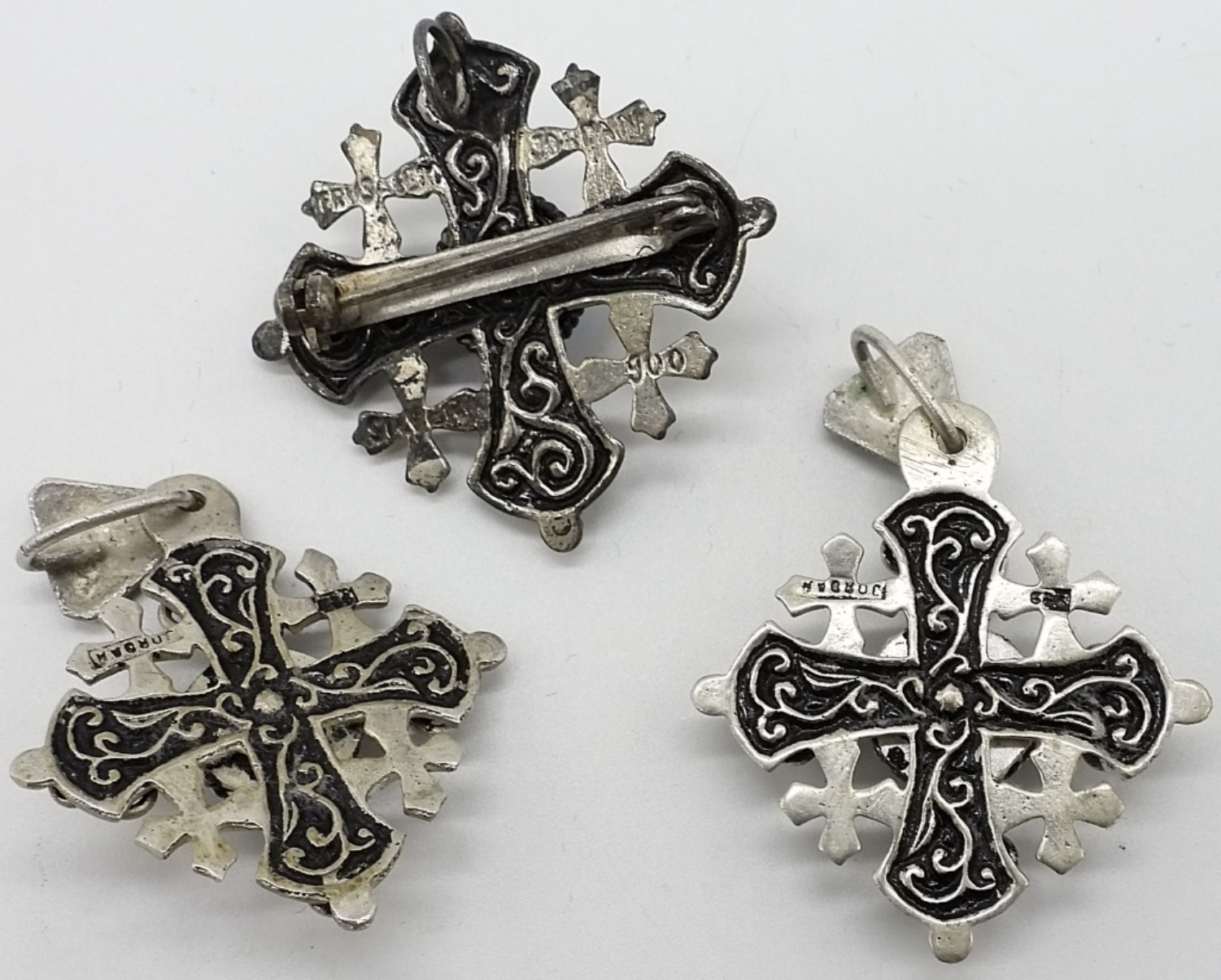 Three 900 Silver Jordan Cross Pendants