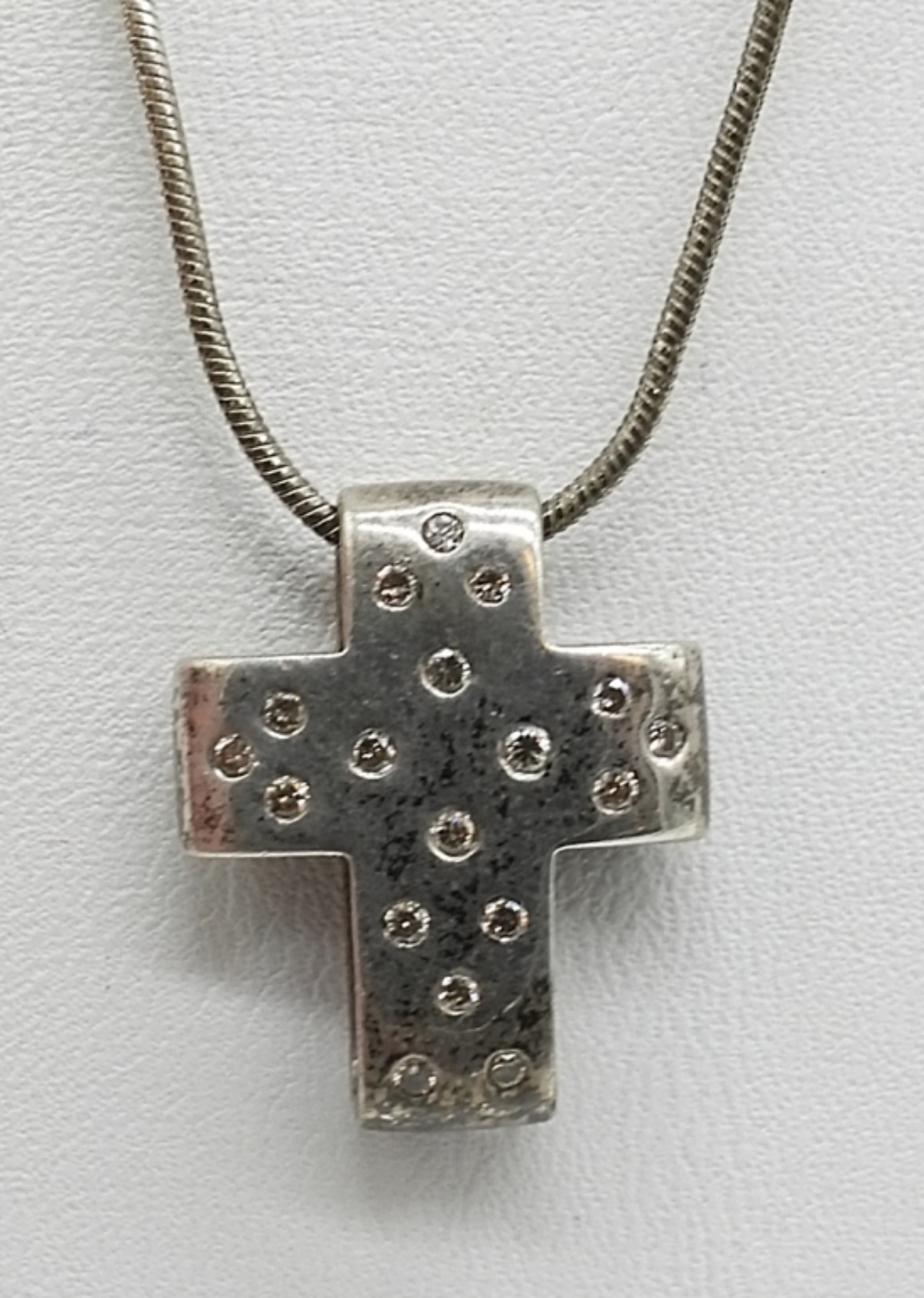 Three Sterling Cross Pendants, Two Chains