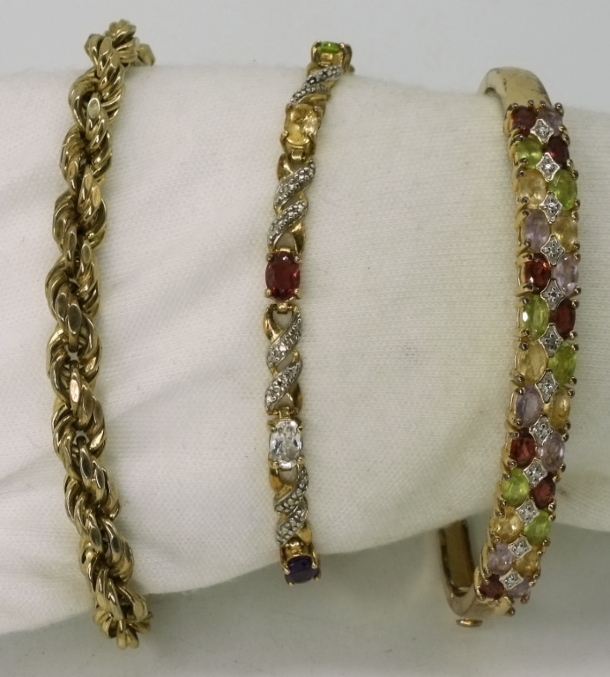 3 Gold Tone Sterling Bracelets
