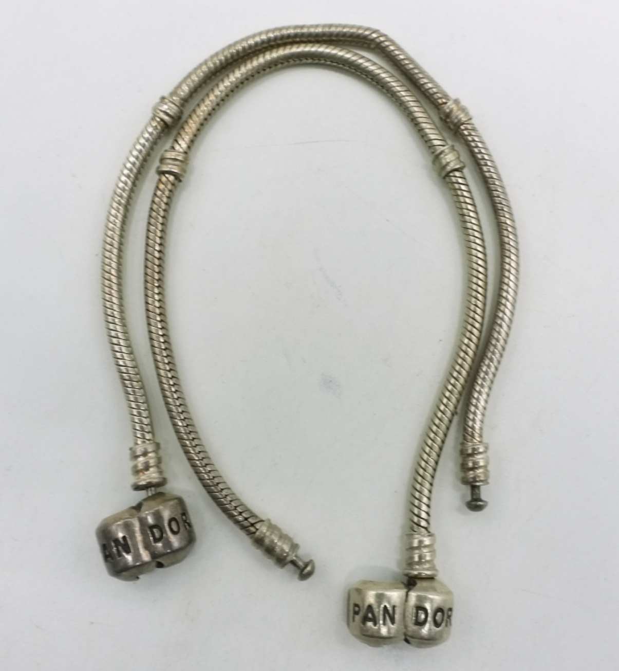 Two Sterling Pandora Charm Bracelets