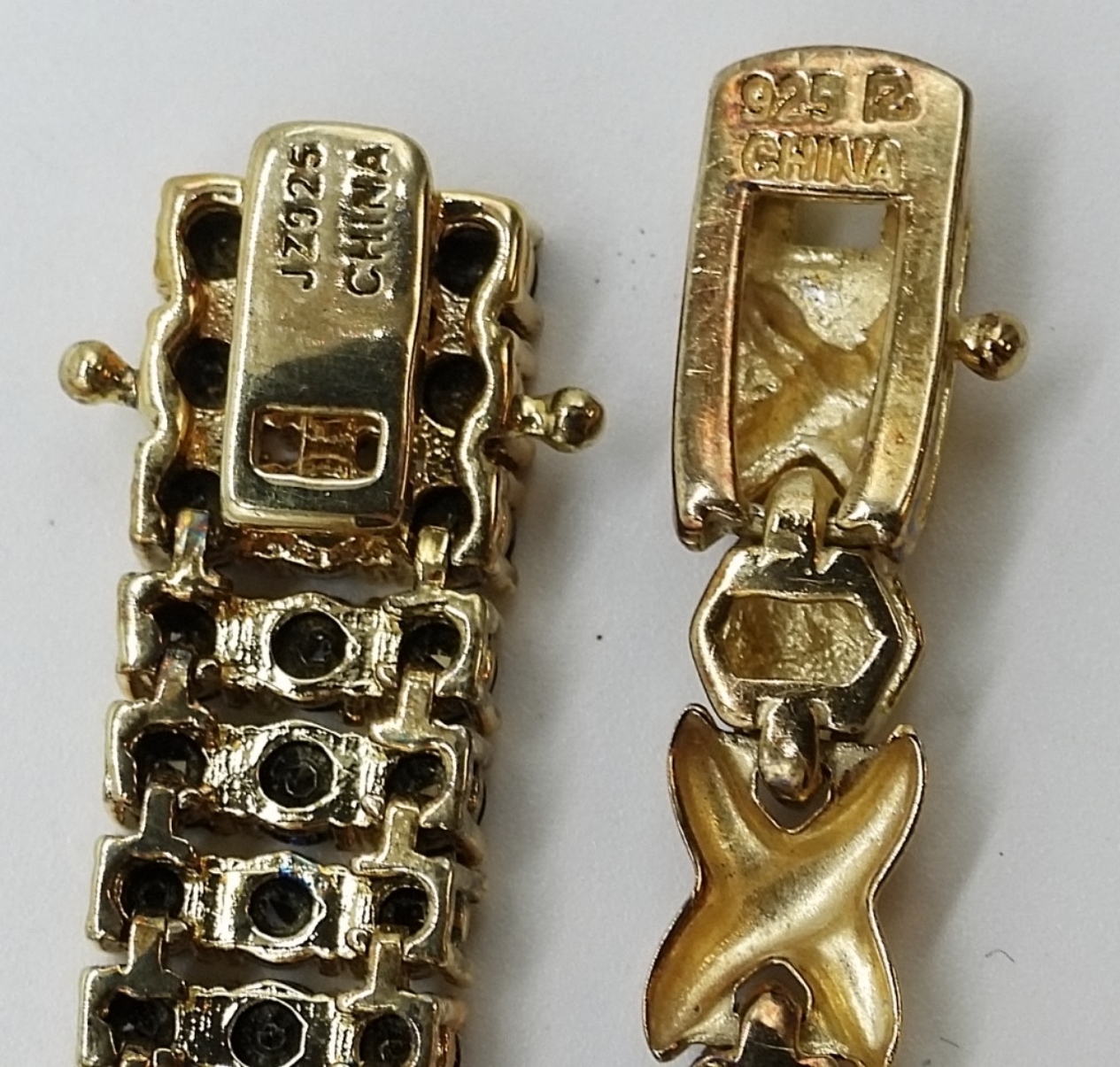 Two Gold-Tone Sterling Bracelets, Black/Clear