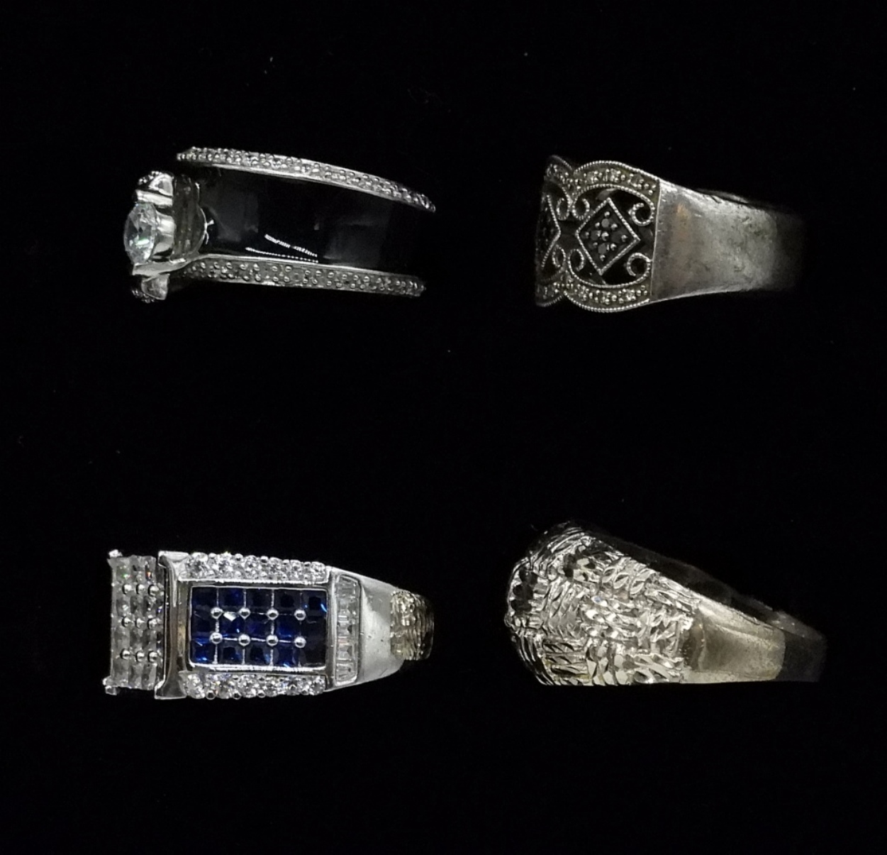 Four Sterling Rings with Gemstones