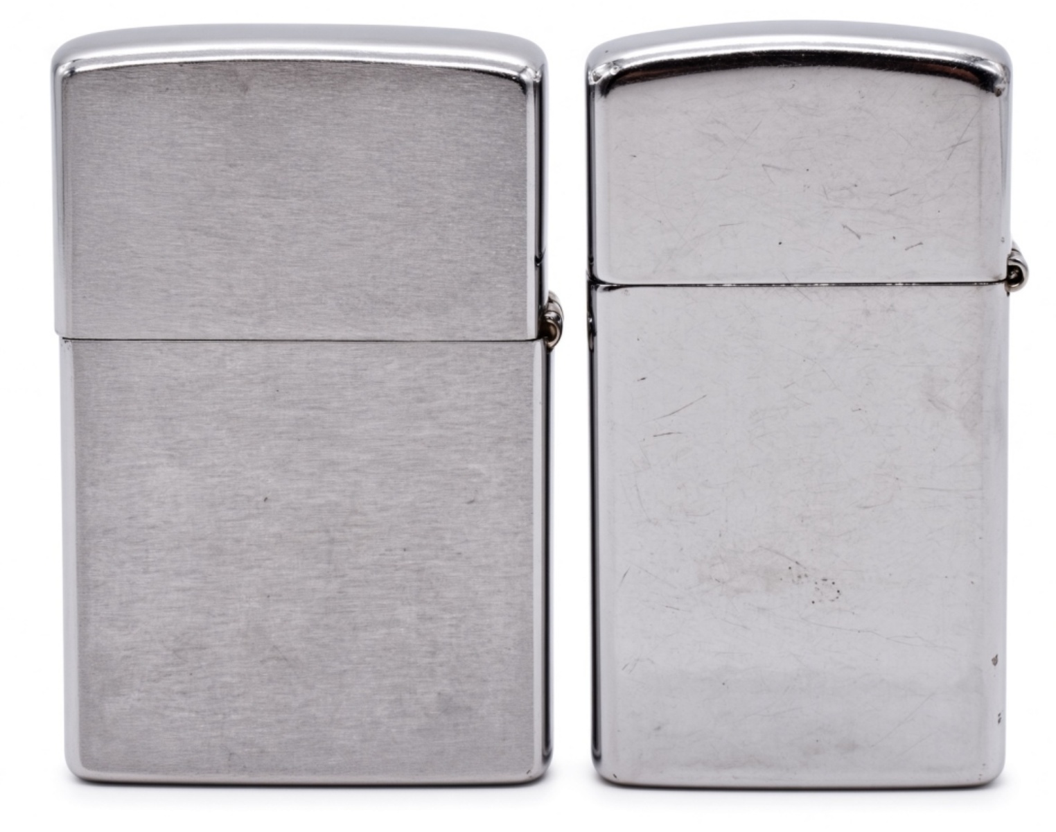 Pair of Golf Zippo Lighters, 1984 and 1991