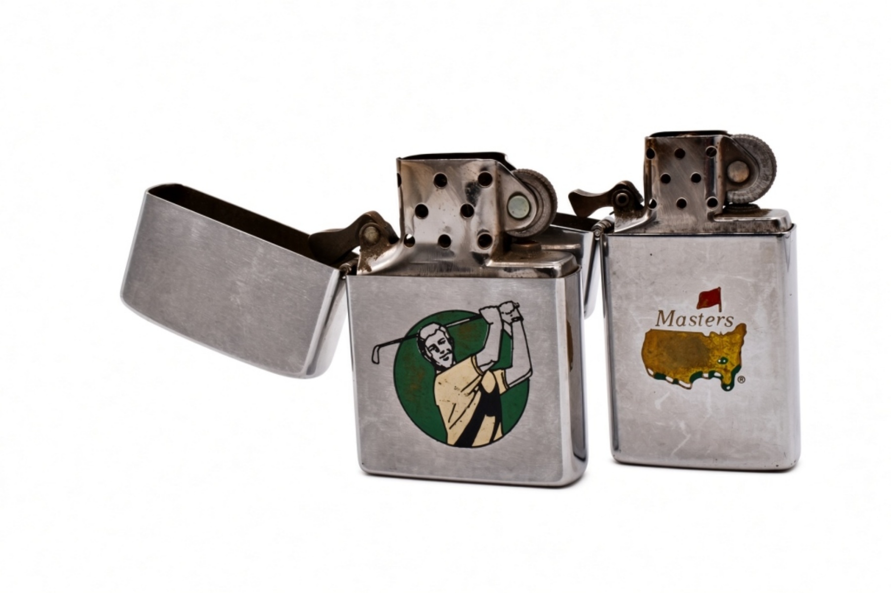 Pair of Golf Zippo Lighters, 1984 and 1991