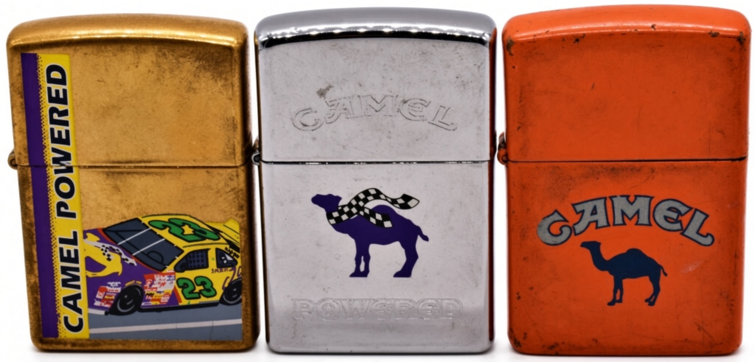 Three Camel Zippo Lighters, Gold, Chrome, Orange