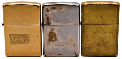 Zippo Lighter Set of 3, Brass and Chrome. Three fired Zippo lighters spanning the early 2000s 